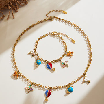 Travel Charm Necklace and Bracelet in Gold and Silver Tone