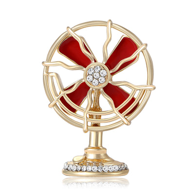 A standing fan with crystal center and colored blades shown on a white background