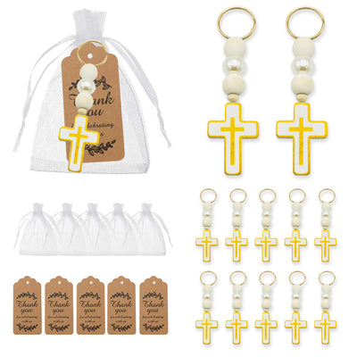 White cross bead keychains displayed with white organza bags and brown thank-you tags