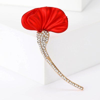 Product display showing a pleated red fabric leaf on a long curved crystal stem
