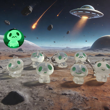 Glow-in-the-Dark Green-Eyed Alien Figure Keychains in Seven Poses