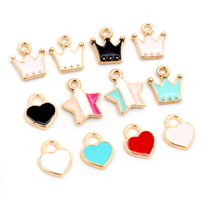Assorted shape charms arranged assortment on a white background