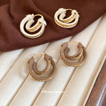 White and Brown Layered Round Huggie Earrings