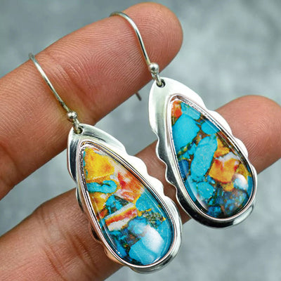 Silver scalloped teardrop turquoise earrings alternate hand-held view