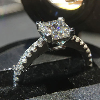 Silver square princess clear stone ring angled close-up
