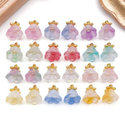 Clear flower charms arranged on a light background