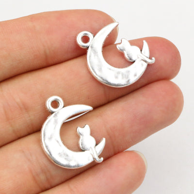 Antique Silver Tone Cat on Crescent Moon Pendants with Star Detail — grouped product view