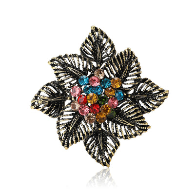 Front view of an eight-petal textured leaf flower with a colorful crystal center