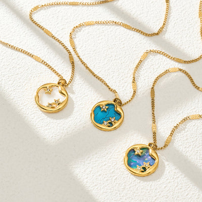 Neckline view of round star and shell inlay necklaces in main image 1.