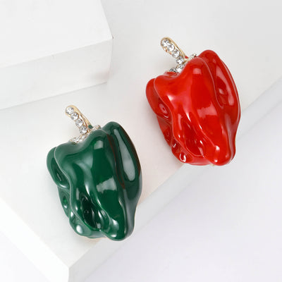 Glossy Enamel Bell Pepper Brooch in Green or Bright Red shown from the front on a white background