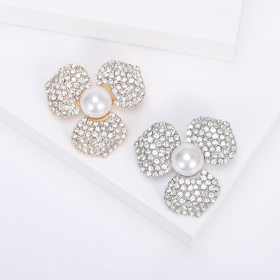 Three Petal Crystal Flower Brooch with Pearl displayed from the front