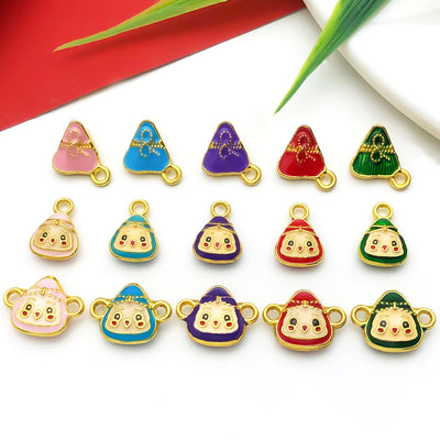 Yellow assorted shape charms arranged on a light background