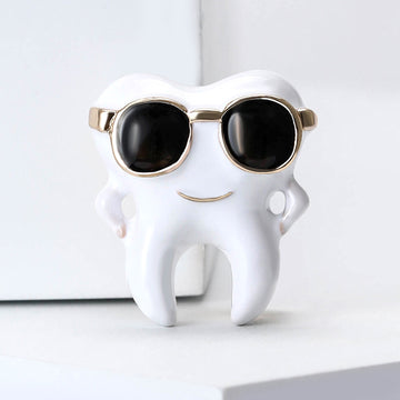 Tooth With Sunglasses Brooch In Metal With White Enamel, Black Lenses, And Gold-Tone