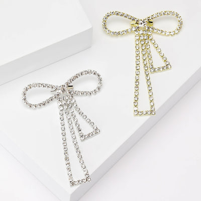 slender crystal bow brooch shown from the front