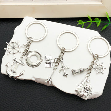 Antique Silver Nautical Anchor and Sailboat Keychain Set