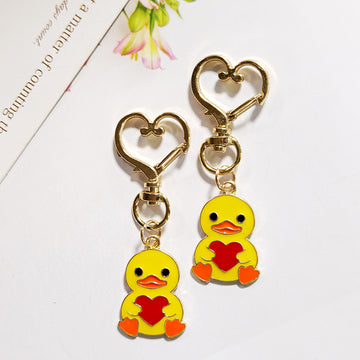 Yellow Heart-Holding Duck Charm with Gold Tone Heart Clasp
