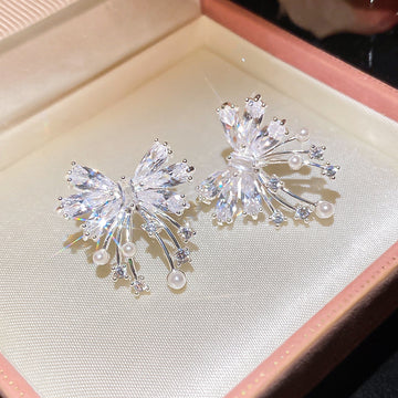 Silver Tone Firework and Bow Crystal Stud Earrings