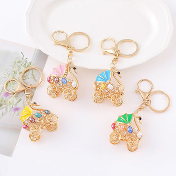 Rhinestone Swan Baby Carriage Keychain Gold Tone Four Colors