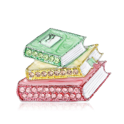Front view of the crystal enamel stacked three books brooch decorative clothing pin on a white background