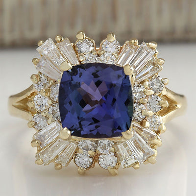 Gold deep blue cushion CZ halo ring top-down face view