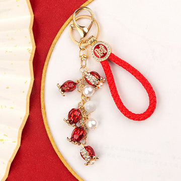 Mixed Red Firecracker Flower Strawberry and Suitcase Fortune Keychains