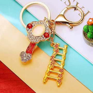 Gold Tone Ladder and Ruyi Keychains with Crystal Heart Details