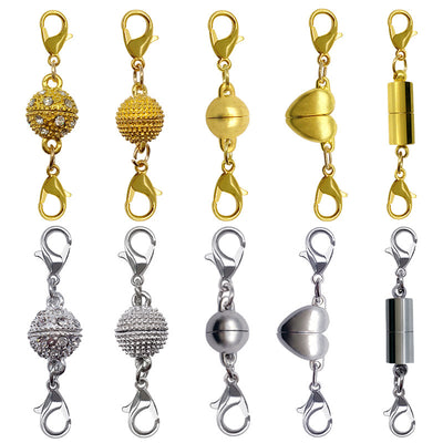 Gold-tone lobster clasp jewelry findings arranged on a light background