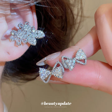 Crystal Flower and Bow Clip On Earrings in Two Designs