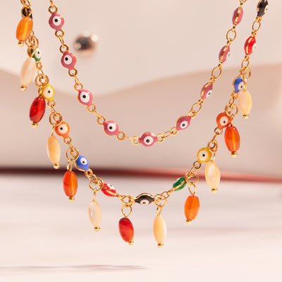 Close-up multicolor enamel evil eye necklace with agate drops