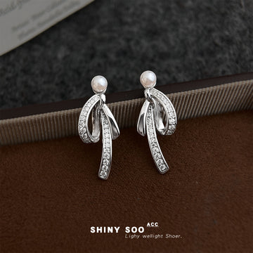 Silver Tone White Pearl And Clear Stone Ribbon Stud Earrings