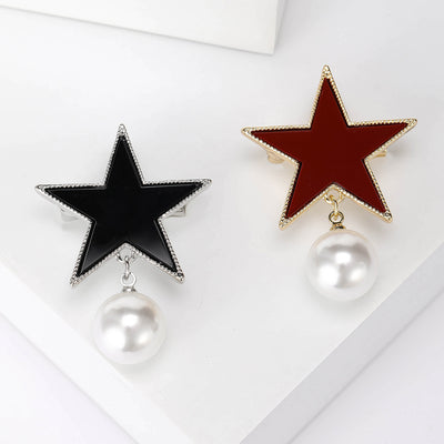 Front view of enamel Star Brooch With Hanging Pearl in Black or Red against a white background.