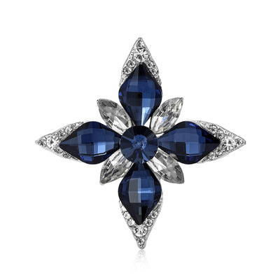 Front view of eight point silver tone star set with four colored glass stones