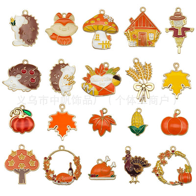 Orange pumpkin charms arranged on a light background