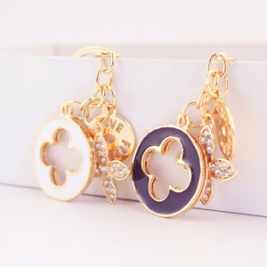 Gold-Tone Clover Keychain with Enamel Disc and Rhinestone Leaves