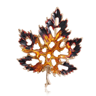 Amber And Dark Crystal Maple Leaf brooch Decorative Lapel Pin shown in front view on a light background