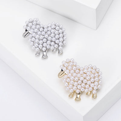 Front view showing the faux pearl sheep brooch with gold or silver tone details