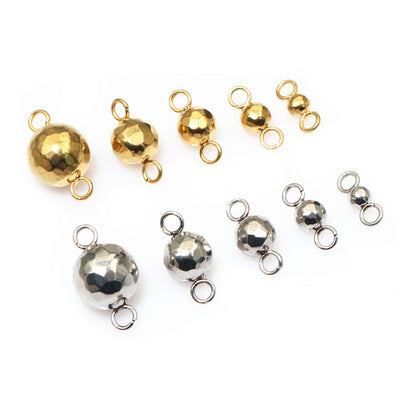 Double Loop Faceted Metal Ball Connectors in Gold and Steel, grouped overview on a plain background