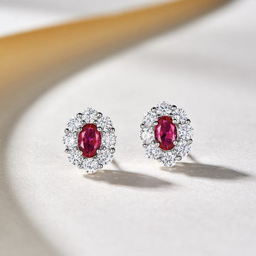 Red Oval Solitaire Halo Stud Earrings In Silver Tone
