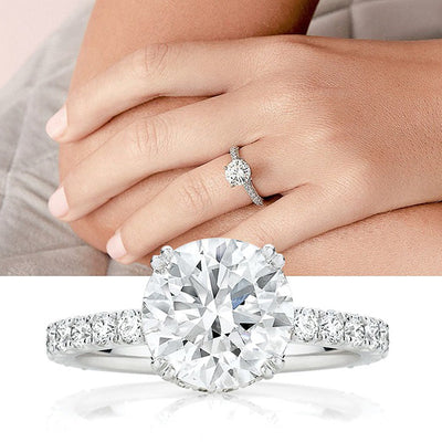 Round clear pave band ring worn on hand and studio product view