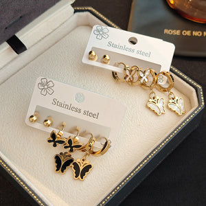 Gold Tone Three Pair Butterfly Stud and Dangle Hoop Earring Set