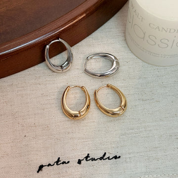 Gold and Silver Irregular Oval Medium Huggie Hoop Earrings