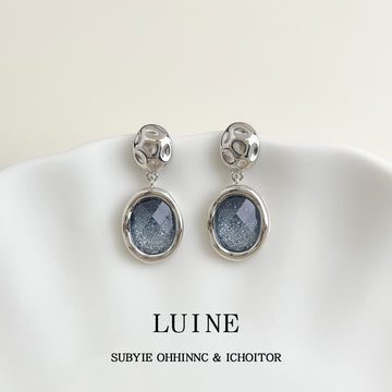 Silver Tone Openwork Top And Blue Gray Round Stone Stud Earrings