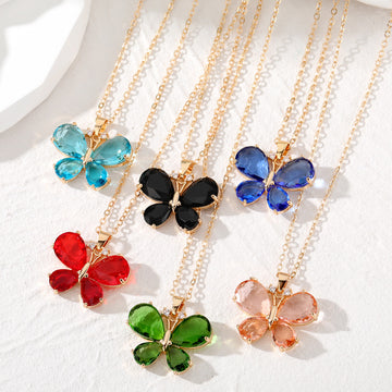 Gold Tone Faceted Crystal Butterfly Pendant Necklaces