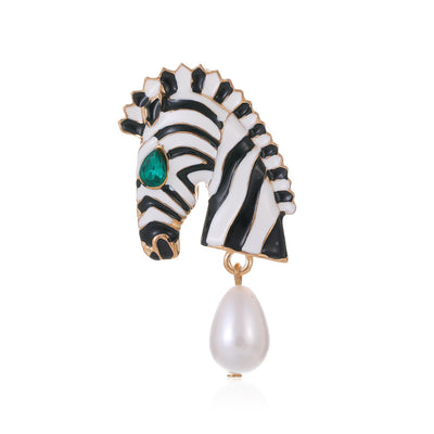 Front product view of the horse head brooch pin in silver and gold