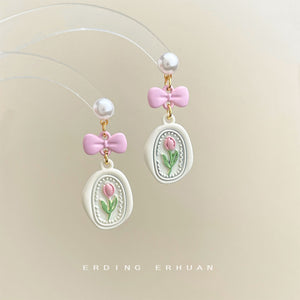 Pearl Pink Bow Tulip Charm Drop Earrings Cream Oval Plaque