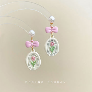 Pearl Pink Bow Tulip Charm Drop Earrings Cream Oval Plaque