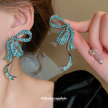 Crystal Bow Statement Earrings in Blue and Silver Tones