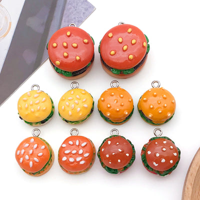 Red cake charms arranged on a light background