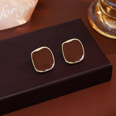 Primary supplied view of brown irregular square studs