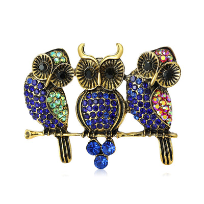 Three Owl brooch shown in front product view